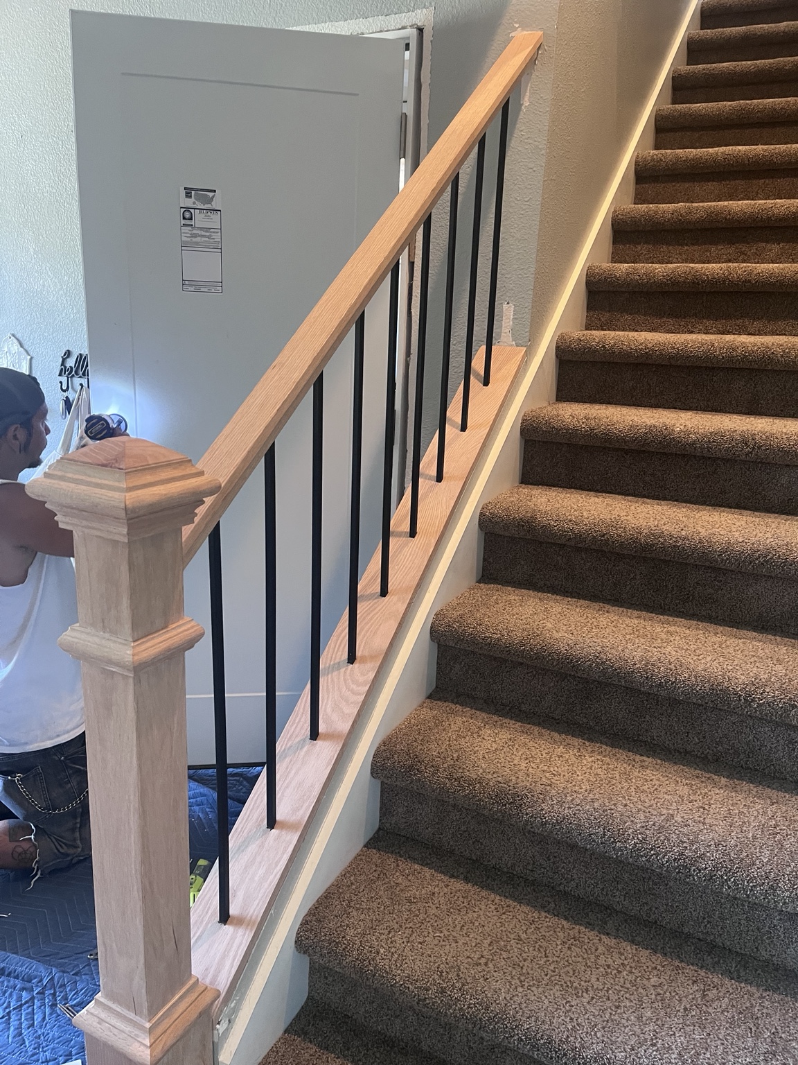 White oak stair railing with black balusters