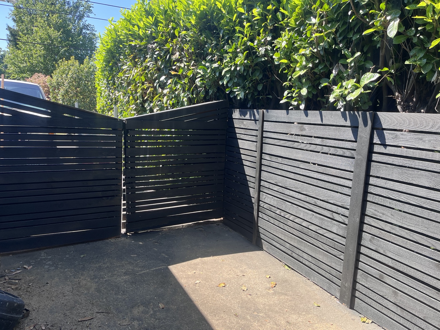 Black horizontal fence and gate